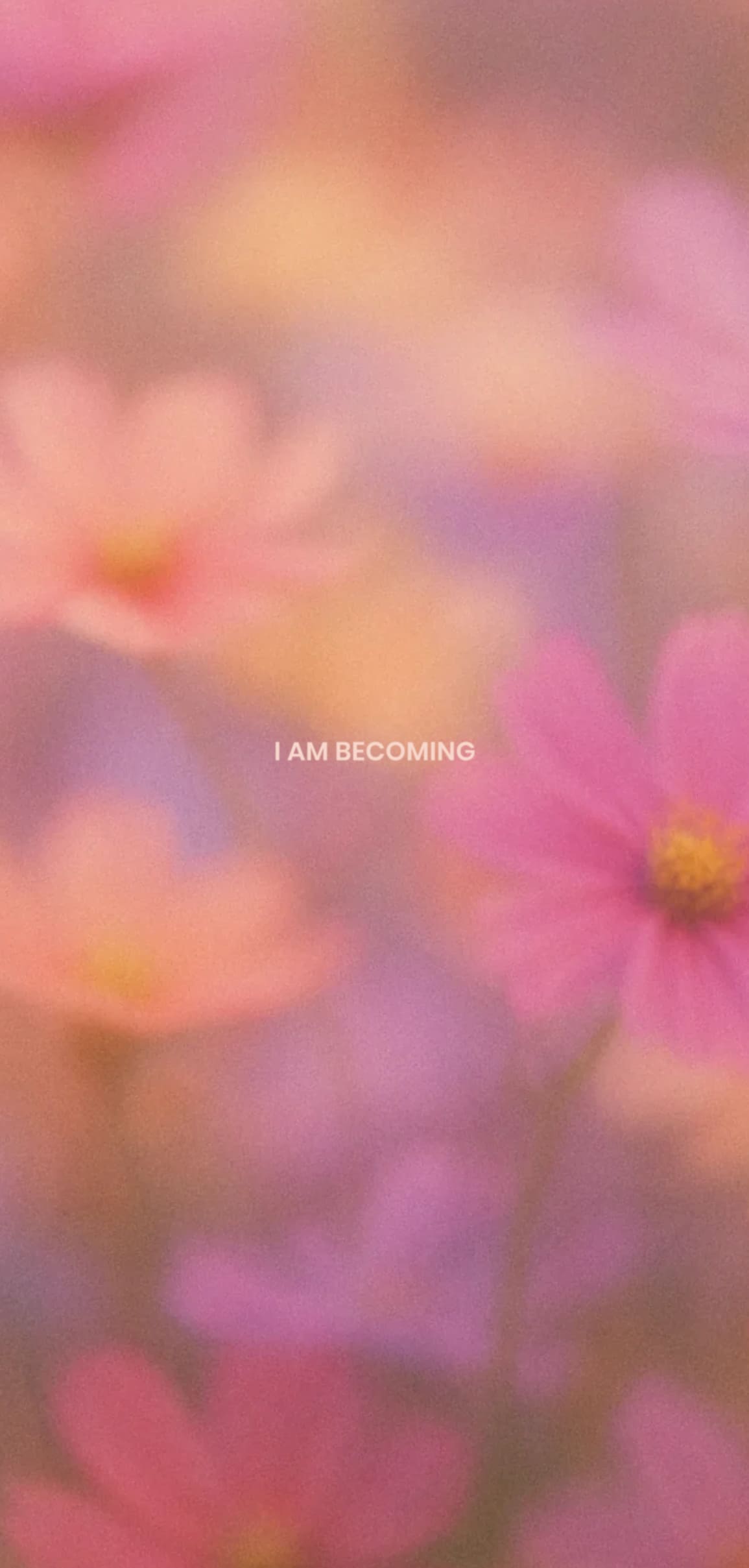 A dreamy image of soft pink flowers with the words “I AM BECOMING” written in white text in the center.