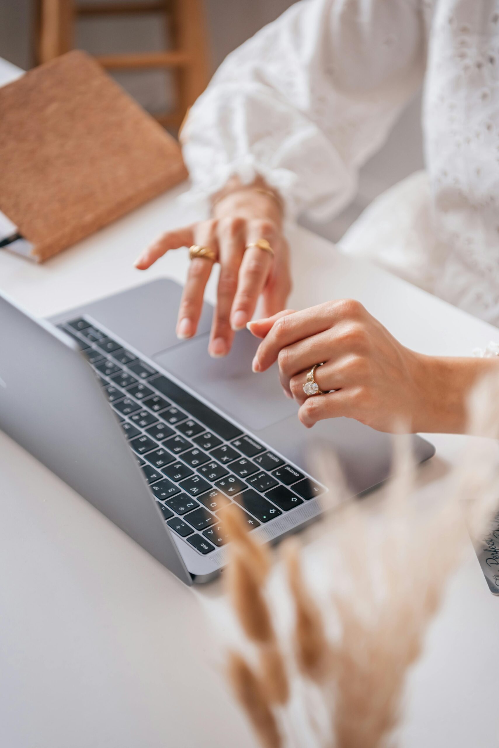 Wellness professional working on a laptop at a cozy desk, symbolizing blogging in 2025 isn’t dead